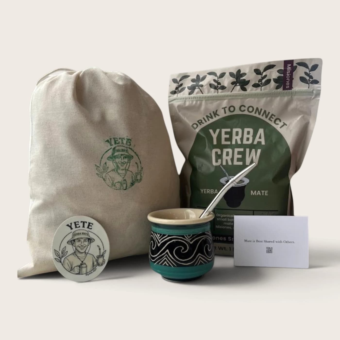 Complete kit with a hand-painted ceramic Mate, filtering straw, organic yerba mate and hand-stamped cotton carrying pouch
